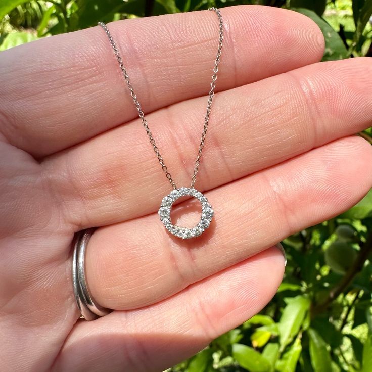 High Quality And Very Well Cut Diamonds In A Classic Circle Design Pendant Hanging From An 18” White Gold Chain. Diamonds: .25ct Total Weight Vs2 Clarity I Color. Metal Content: 18k White Gold. Dimensions: The Pendant Measures 10mm Diameter And The Chain Is 18 Inches Long. Weight: 1.9 Grams. Diamond White 14k Gold Round Cut Necklace, 14k White Gold Diamond White Round Cut Necklace, 14k White Gold Diamond White Round Cut Necklaces, Round Cubic Zirconia Necklace With Halo Design, Round Diamond Necklace With Prong Setting, Round Platinum Diamond Necklace, Sterling Silver Necklace With Brilliant Cut, Dazzling 14k White Gold Round Necklaces, Diamond White Platinum Necklace With Halo Design