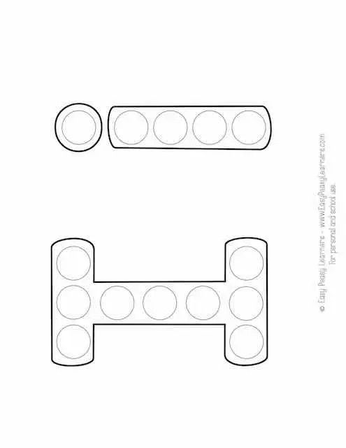 a drawing of the shape of a car's headlight and tail lights, with circles on each side