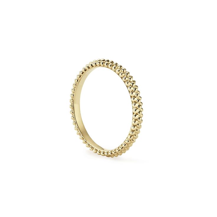 An 18K gold Caviar beaded stacking ring. Perfect to layer with other rings. Fine Jewelry Yellow Gold Stackable Cluster Ring, Stackable 14k Gold Pearl Ring With Round Band, Yellow Gold Stackable Pearl Ring For Anniversary, Gold Stackable Cluster Ring Fine Jewelry, Gold Stackable Cluster Ring In Fine Jewelry Style, Gold Stackable Pearl Ring In 14k Gold, Stackable Yellow Gold Dome Ring For Wedding, Stackable Cluster Ring With Round Band, Heirloom Yellow Gold Stackable Diamond Ring