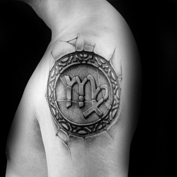 a black and white photo of a man's arm with an astro sign on it