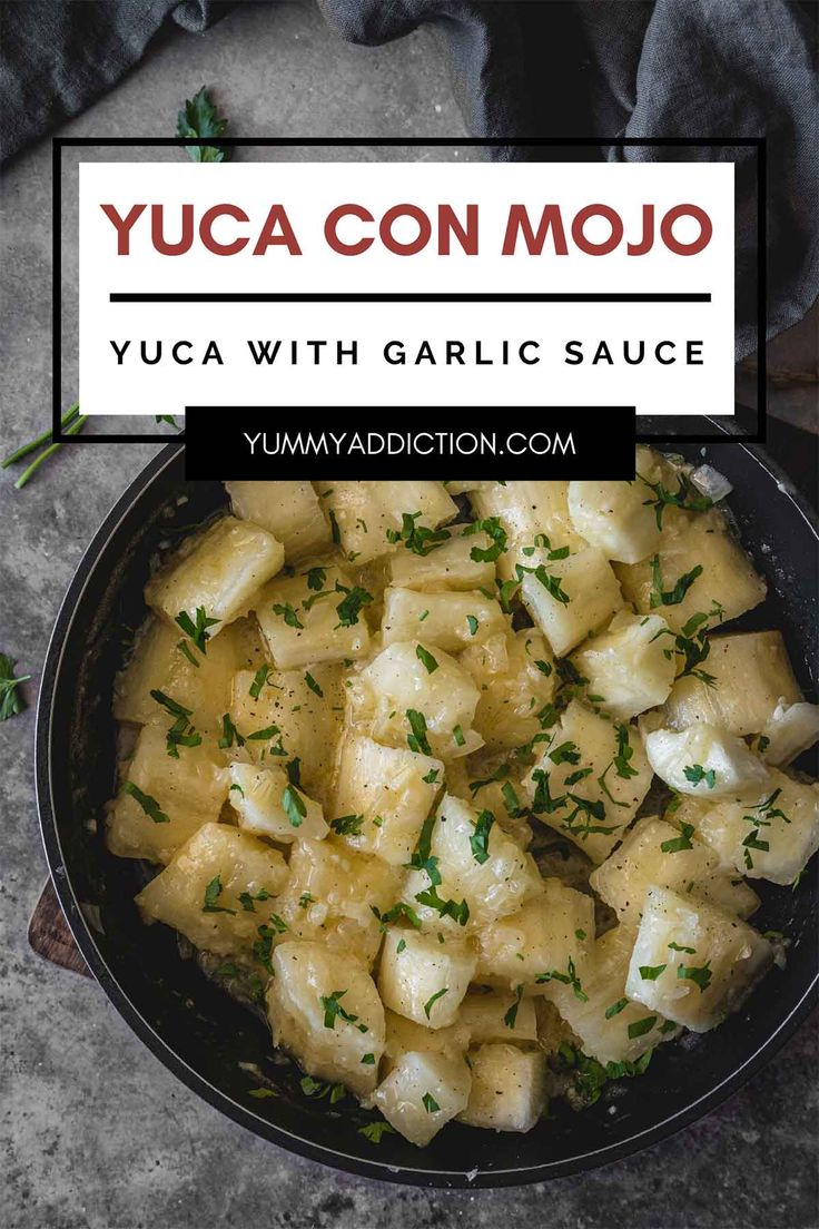 yuca con mojo with garlic sauce in a black bowl on top of a table