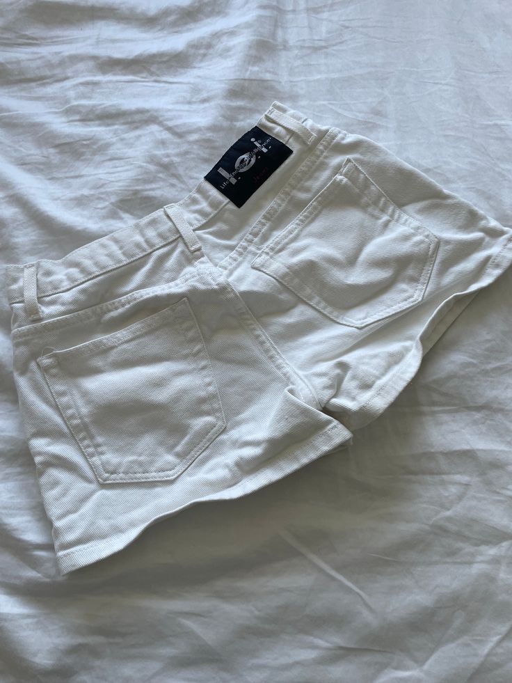 Waist: 27 inches Fitted Mid-rise Cotton Shorts, Fitted Casual Jean Shorts, Casual Fitted Jean Shorts, Stretch Cotton Mid-rise Shorts, Stretch Mid-rise Cotton Shorts, Chic Stretch Mid-rise Shorts, Casual Fitted Cutoff Shorts, Fitted Cutoff Shorts With Pockets, Chic Fitted Jean Shorts