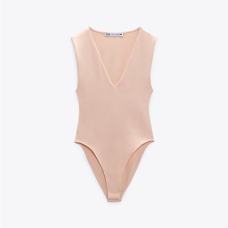 Bodysuit With A V-Neckline, Wide Straps And Snap-Button Fastening At The Bottom. Color - Light Pink/Nude Size - Medium Condition - Bnwt Summer V-neck Bodysuit For Workwear, Zara V-neck Bodysuit For Summer, Beige V-neck Bodysuit For Spring, Trendy Zara Bodysuit, Spring Beige V-neck Bodysuit, Chic Zara V-neck Bodysuit, Zara V-neck Summer Bodysuit, Zara V-neck Bodysuit For Parties, Fit Illustration