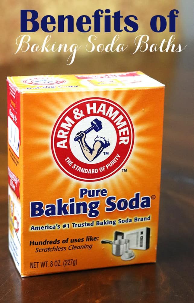 an orange box sitting on top of a wooden table with the words baking soda behind it