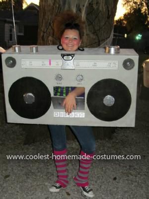 a woman holding up a boom box costume