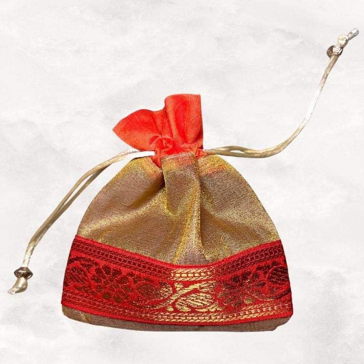 Beautiful Orange and Gold Gift bags, perfect for party favors during Sangeet, Mendhi, Reception ot Indian Wedding Red Potli Bag For Festivals And Gifts, Festival Party Gift Bag Pouch, Festive Party Gift Bag Pouch, Red Rectangular Bag For Celebration, Red Festive Bag For Festivals, Festive Red Bag For Gift Occasions, Red Festive Gift Bags, Festive Red Bags For Gifts, Red Rectangular Pouch For Festivals