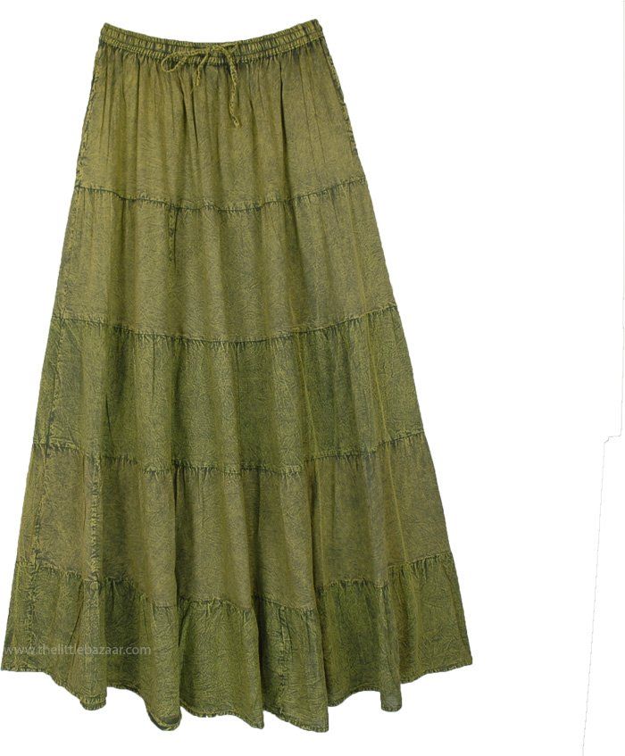 A stonewashed solid green skirt with tiers, this long maxi skirt could look understated but could be a great choice for maxi-style country wear, or cottage core aesthetic. It has an elastic drawstring waist and pockets on either side, handy for storing essentials. #tlb #TieredSkirt #MaxiSkirt #bohemianfashion #Cottonskirt #LongSkirt Patterned Maxi Skirt, Green Tiered Maxi Skirt For Summer, Peasant Style Ruffled Maxi Skirt, Green Tiered Maxi Skirt For Spring, Green Tiered Ruffle Maxi Skirt, Green Bohemian Tiered Skirt, Bohemian Tiered Green Skirt, Bohemian Green Tiered Skirt, Peasant Style Tiered Ruffled Maxi Skirt