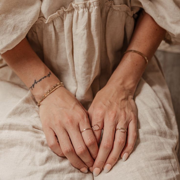 Our prettiest little glimmering stacking band, the Pippa Disc Stacking Ring is one to add to your digit set. We absolutely love wearing this in a beautiful dainty stack. These rings are handmade just for you and available in Gold Fill or Sterling Silver. As they are handmade, each one is unique. You may notice the tiny join where your ring has been soldered. Handmade Dainty 14k Gold Midi Rings, Gold Dainty Double Band Stackable Rings, Dainty 14k Gold Filled Round Midi Rings, 14k Gold Filled Midi Rings With Simple Design, Dainty Gold Double Band Stackable Rings, Delicate 14k Gold Filled Midi Rings As Gift, Delicate 14k Gold Filled Midi Rings For Gift, Dainty Handmade Adjustable Midi Rings, Delicate 14k Gold Filled Toe Ring