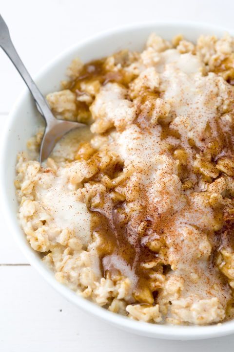 a bowl filled with oatmeal topped with cinnamon