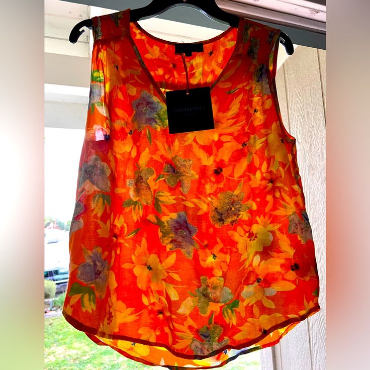 Orange Flowers Sleeveless Blouse Spring Floral Print Multicolor Tank Top, Spring Sleeveless Floral Print Tops, Multicolor Vest Blouse For Spring, Floral Print Sleeveless Tops For Spring, Floral Print Sleeveless Tank Top For Summer, Sleeveless Floral Print Tops For Spring, Multicolor Sleeveless Blouse For Spring, Spring/summer Sleeveless Blouse, Floral Print Sleeveless Blouse Tank Top For Vacation