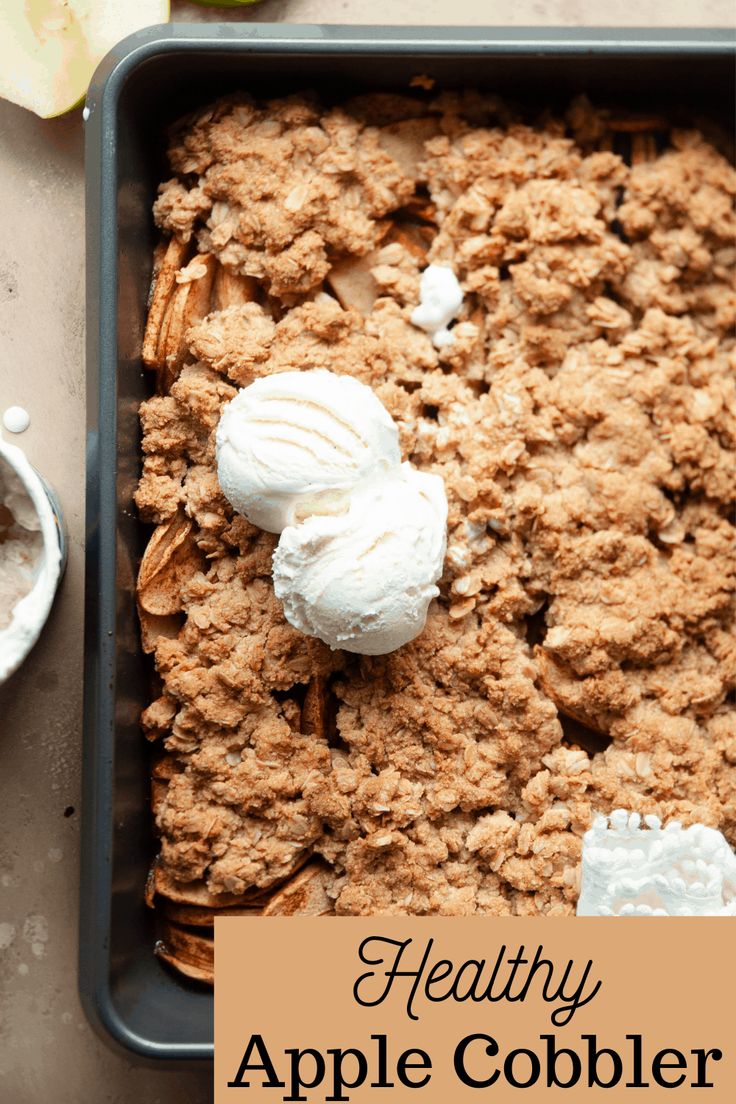 an apple cobbler in a baking pan with the words healthy apple cobbler above it