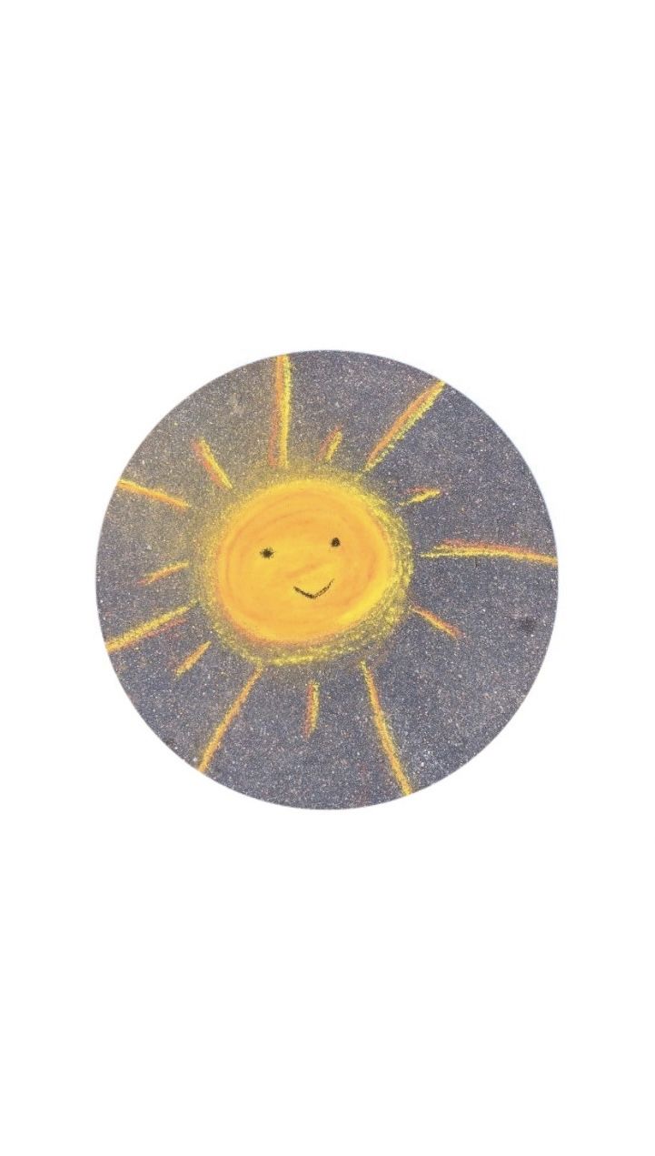 a drawing of a sun with a smiley face on it