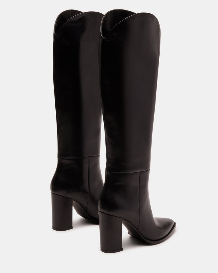 A pointed toe and curved topline give the BIXBY block heel knee boot a Western edge while the sleek upper highlights the clean monochrome look Point toe block heel knee boot Slip-on style Curved topline 3.5 inch heel height Size 6 measurements: 15.5 inch shaft circumference, 14.25 inch shaft height Size 8 measurements: 16 inch shaft circumference, 15 inch shaft height Size 10 measurements: 17 inch shaft circumference, 15.5 inch shaft height Leather upper material Synthetic and textile lining Syn Black Knee High Boots Suede, Black Women Fall Fashion, Styling Ankle Boots, Black Leather Boots Outfit, Black Leather Heel Boots, Flat Black Boots, Womens Black Boots, Black Boots For Women, Tall Heeled Boots