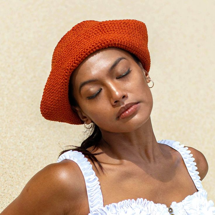 Gani Sailor Crochet hat in Roobois Tea Brown is hand-crocheted in breathable cotton yarn by our local artisans in Java island. Featuring a modern twist of the cloche hat shape Handwoven Flat Brim Crochet Hat In Toquilla Straw, Handwoven Toquilla Straw Crochet Hat With Flat Brim, Tea Hat, Casual Handwoven Crochet Hat With Curved Brim, Knitted Hat With Curved Brim For Vacation, Crochet Hat With Short Brim For Vacation, Vacation Hat With Short Brim And Knitted Details, Knitted Crochet Hat With Short Brim For Vacation, Casual Handwoven Crochet Hat With Flat Brim