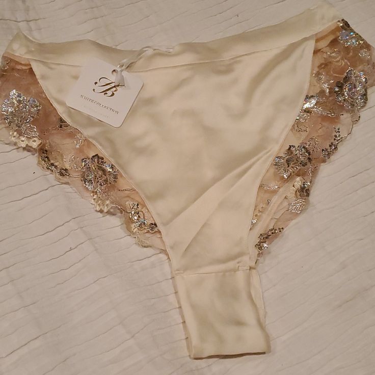 Honey Birdette Silk Shorts Whitney Ivory Medium New With Tag! (I Also Have The Ivory Pants In A Small Available) Elegant Brief Bottoms For Loungewear, Cream Lace Trim Bottoms For Loungewear, Feminine Beige Bottoms For Loungewear, Feminine Beige Loungewear Bottoms, Beige Feminine Bottoms For Loungewear, Feminine Beige Lounge Bottoms, Chic Beige Bottoms For Wedding, Feminine Cream Bottoms For Wedding, Feminine Beige Party Bottoms