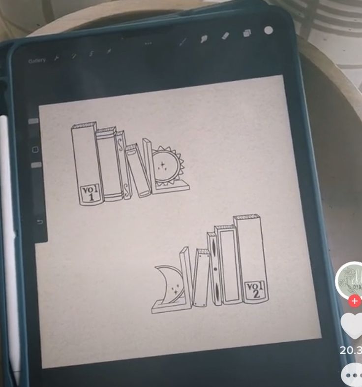 a tablet with some drawings on the screen