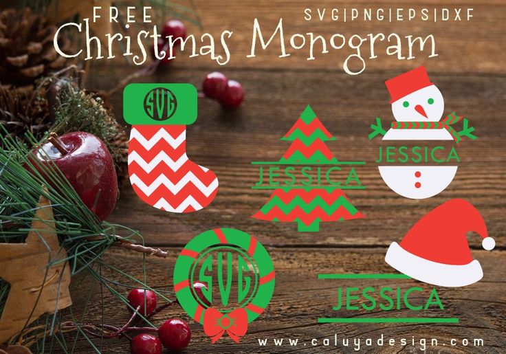 christmas monograms with santa hat, stockings and other holiday decorations on a wooden table