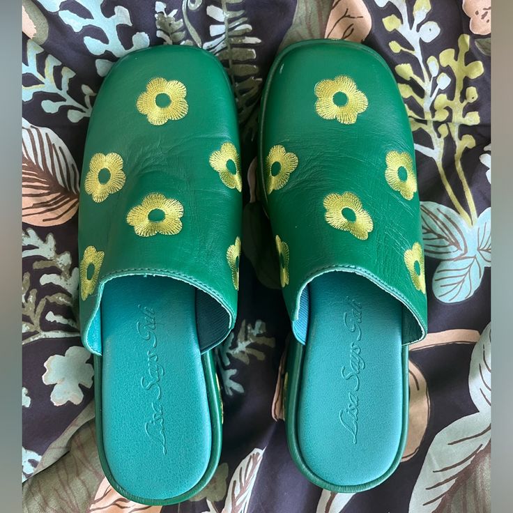 Never Worn - They Are Not My Size! Two Very Small Scuffs (Shown In Last Two Pictures). Questions? Leave A Comment Below! I’m Open To Offers! Green Casual Clogs With Flat Heel, Casual Green Clogs With Flat Heel, Green Flat Heel Casual Clogs, Casual Green Mules With Leather Sole, Comfortable Green Mules With Cushioned Footbed, Casual Green Slip-on Mules, Green Closed Toe Mules With Cushioned Footbed, Green Clogs With Cushioned Footbed For Summer, Green Cushioned Clogs For Summer