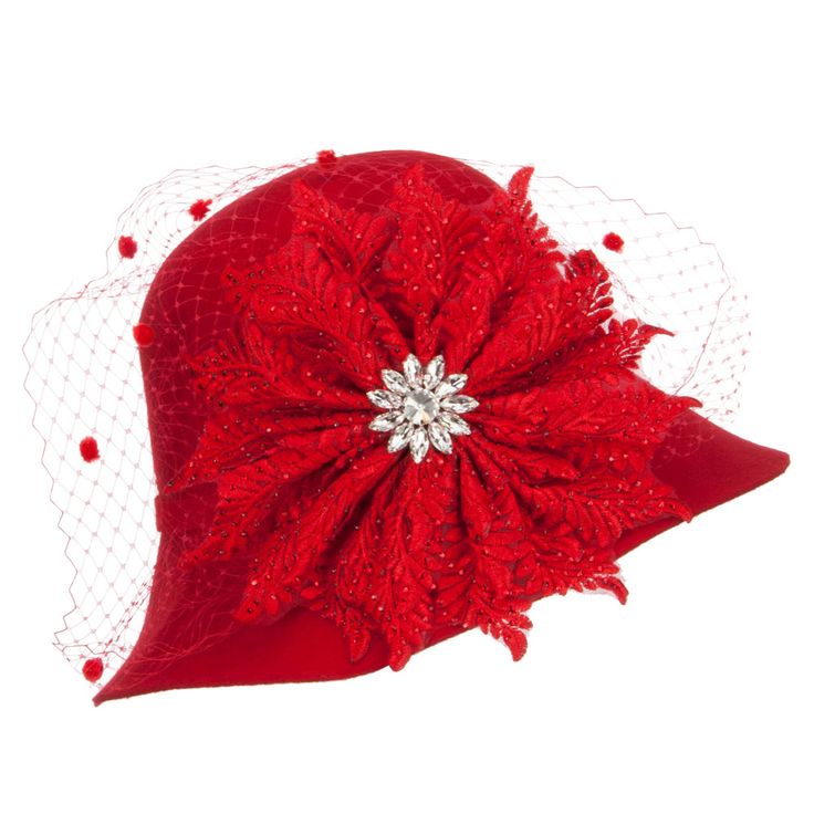 Flower Crystal Net Pom Wool ClocheMade of 100% wool.One size fits most women with an inner elastic adjustable tie, fitting up to 7 1/4.Fitted with an inner satin hatband.Adult/Woman.Crown measures 4 inches deep.Brim measures 3 - 3.5 inches long.Hand wash only.Imported. Fashionable wool felt cloche hat for ladies.Round and flexible crown.A big flower decoration with a small crystal flower inside is accented on one side.Decoration is detailed with a net and small poms.Slanted brim; side brim is sl Adjustable Costume Hats And Headpieces For Church, Evening Felt Hat With Short Brim, Church Fascinator One Size Fits Most, Elegant Winter Adjustable Fascinator, Winter Party Wool Cloche Hat, Elegant Bonnet For Spring, Evening Wool Hats, Elegant Adjustable Mini Hats For Winter, Elegant Winter Mini Hats Adjustable