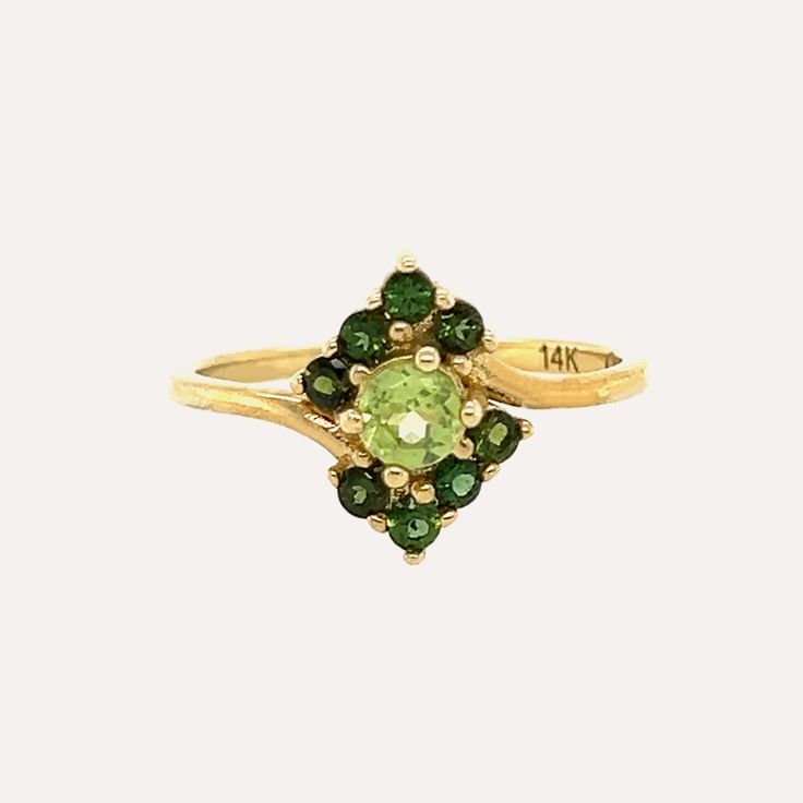 We took inspiration from Cimorene, the princess of Dealing with Dragons to name this beautiful ring made of carefully selected green peridot stones in different tones. A main stone adorned with six small darker toned peridot stones make this piece truly special. Green Peridot is believed to bring good health, restful sleep and peace to relationships. Dealing With Dragons, Phone Items, Peridot Stone, Garnet Ring, Green Peridot, Restful Sleep, Garnet Rings, Good Health, Beautiful Ring