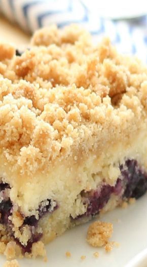 a piece of blueberry crumb cake on a plate