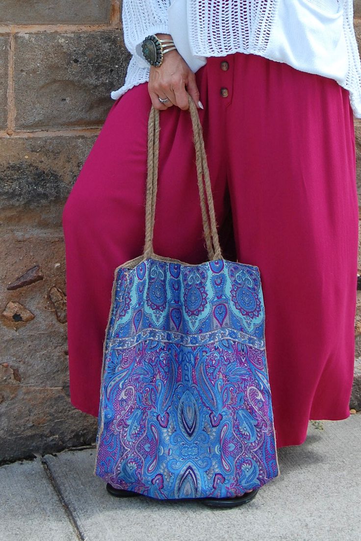 The Pam Printed Jute Bag in Blue Paisley ♡ Product Highlights ♡ Our Pam Printed Jute Bag in Blue Paisley is the perfect bag and unique touch to add to any on-trend bohemian style outfit! As an everyday purse, a trusty beach or pool bag, or even as a travel bag, this Pam Printed Jute Bag in Blue Paisley will be a perfect addition to your closet! ✁ Contents & Measurements ✁ Our Pam Printed Jute Bag in Blue Paisley features: • 100% Polyester fabric • A 17 inch length and a 14 inch width. • 13 inch Blue Tote Hobo Bag For Festivals, Blue Summer Hobo Tote Bag, Everyday Use Bags With Paisley Print, Casual Multicolor Paisley Print Bags, Bohemian Purple Shoulder Bag For Everyday, Blue Summer Hobo Shoulder Bag, Purple Bohemian Bag For Everyday Use, Bohemian Purple Bags For Everyday Use, Summer Vacation Blue Hobo Bag