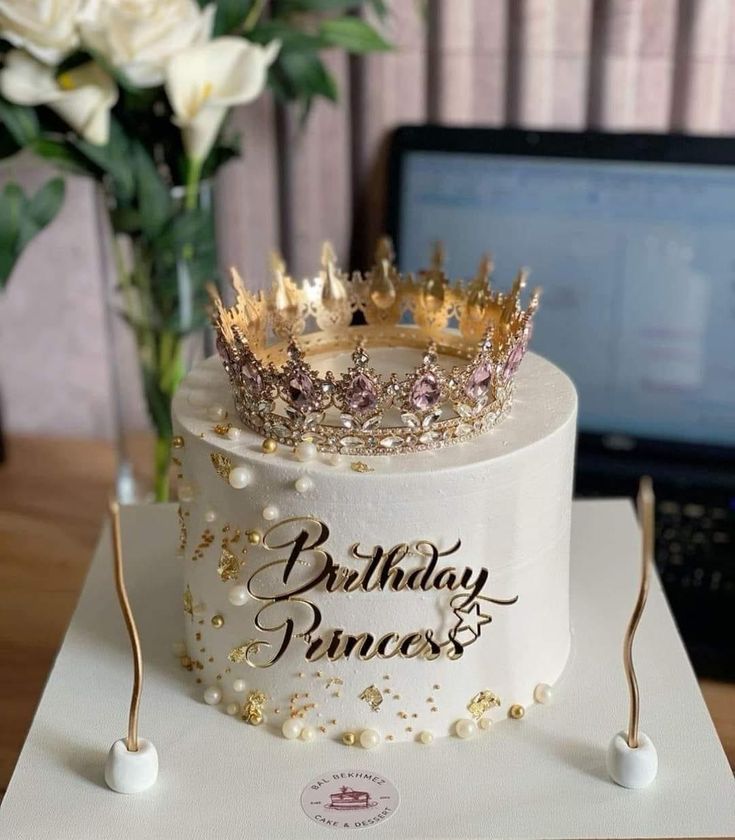 a birthday cake with a crown on top