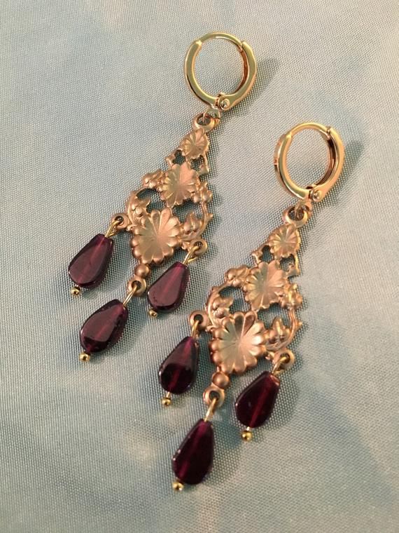 Small GARNETS Chandelier, Brass and Gold earrings, Pair of reproduction 19th century chandelier EARRINGS, teardrop shaped real GarnetsVictorian reproduction Chandelier earrings - these lovely chandelier style reproduction earrings are made with tiny Real GARNET teardrop dangles, mounted on gold brass chandelier and finished with 16k gold plated brass LOOPS with a lovely soft close. These lovely chandelier earrings have three beautiful red real GARNET dangles on each chandelier, that gently swing Victorian Chandelier Dangle Earrings For Formal Occasions, Antique Brass Chandelier Earrings, Antique Chandelier Earrings For Formal Occasions, Antique Dangle Chandelier Earrings For Formal Occasions, Antique Formal Dangle Chandelier Earrings, Gold Baroque Victorian Earrings, Gold Victorian Baroque Earrings, Victorian Dangle Earrings For Formal Occasions, Antique Filigree Chandelier Drop Earrings