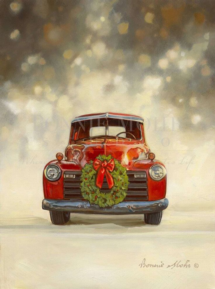 an old red car with a wreath on the hood