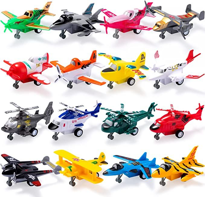 small toy airplanes are lined up in a row