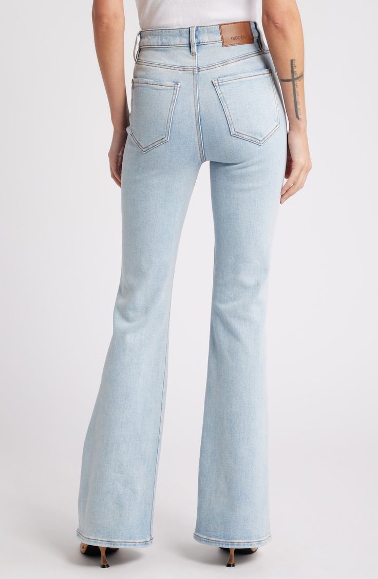 Cleanly styled for a casual-chic look, these light-wash flare jeans are made from stretchy denim with a high waist and full-length legs. 34" inseam; 11 1/2" front rise Zip fly with button closure Five-pocket style 93% cotton, 5% polyester, 2% spandex Machine wash, tumble dry Imported Light Wash Stretch Flare Jeans, Trendy Light Wash Wide Leg Flares, Light Wash Wide Leg Flares For Spring, High Rise Light Wash Stretch Flares, Light Wash High Rise Flares For Spring, Chic Flare Jeans In Light Wash, Mid-rise Medium Wash Flares For Spring, Trendy Fitted Light Wash Flare Jeans, High Rise Denim Flares For Spring