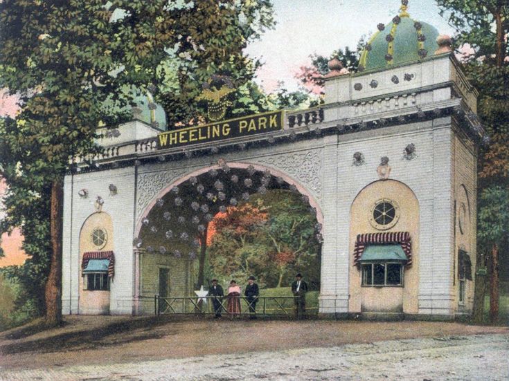 an old painting of a building with people standing outside and trees in the back ground