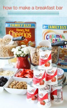 the breakfast bar is full of cereal, yogurt, and strawberries to be eaten