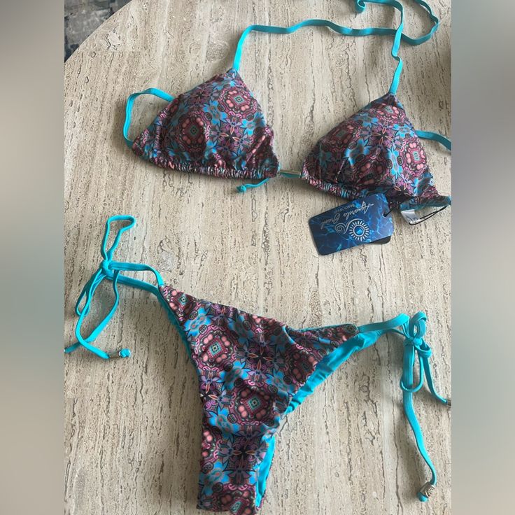 This Brand New Bikini Straight From Brazil In A Size Large Will Make A Great Addition To Your Summer Essentials. It Is A Very Unique And Colorful Design That Will Complement Your Style. High Quality Fabric, Extremely Soft, I Can’t Say Enough Of How Soft It Is, Quick Dry And Uv Protection. Tie Top, Comes With Removable Padding. Tie Bottom, So You Can Adjust How You Like. Turquoise Fitted Tie-side Swimwear, Turquoise Beachwear Swimwear For Festival, Blue Tie-side Bottom Swimwear For Festivals, Blue Festival Swimwear With Tie-side Bottom, Tropical Bikinis, Idea Board, Tie Top, Colorful Design, Swimsuit Tops