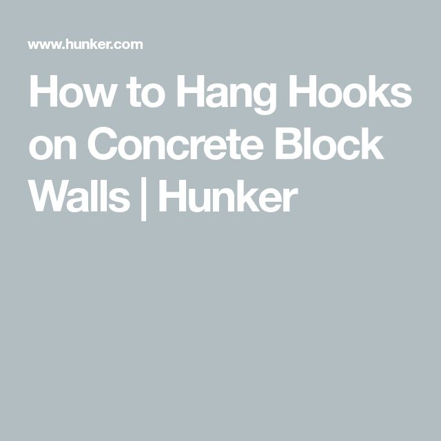 the words how to hang hooks on concrete block walls / hunker in white