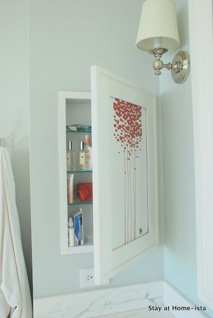 the bathroom is clean and ready to be used as a storage area for personal items