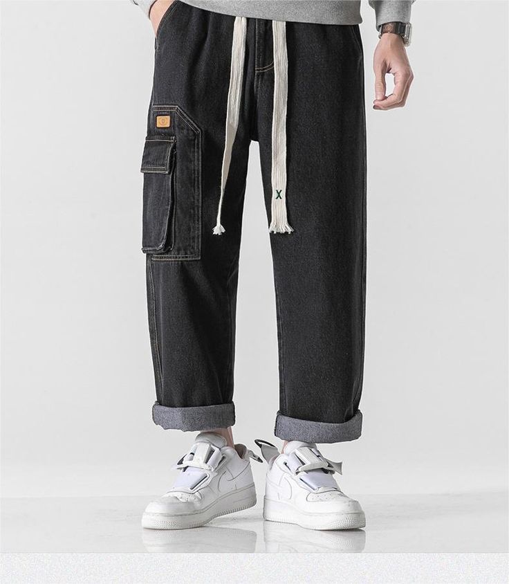 Introducing the 2023 Spring-Summer Collection's trendiest modern statement ââ‚?the Baggy Cargo Stonewashed Denim Pants! Showcasing a unique blend of modern fashion and nostalgic grunge. these mid-rise pants are sure to elevate any outfit. Crafted with premium quality denim. they promise durability and style. making them your next wardrobe staple.Distinctive Features: Grunge Elegance: Tap into the iconic '90s gritty movement with these effortlessly cool pants. Stonewashed Finish: Expertly crafted Baggy Washed Black Jeans With Cargo Pockets, Hip Hop Jeans With Pockets For Summer, Summer Hip Hop Jeans With Pockets, Baggy Cargo Style Washed Black Jeans, Summer Hip Hop Cargo Jeans With Relaxed Fit, Summer Hip Hop Relaxed Fit Cargo Jeans, Summer Hip Hop Relaxed Cargo Jeans, Baggy Washed Black Hip Hop Bottoms, Casual Washed Black Cargo Jeans With Side Pockets