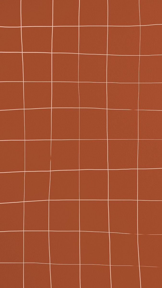 an orange wall with white lines on it