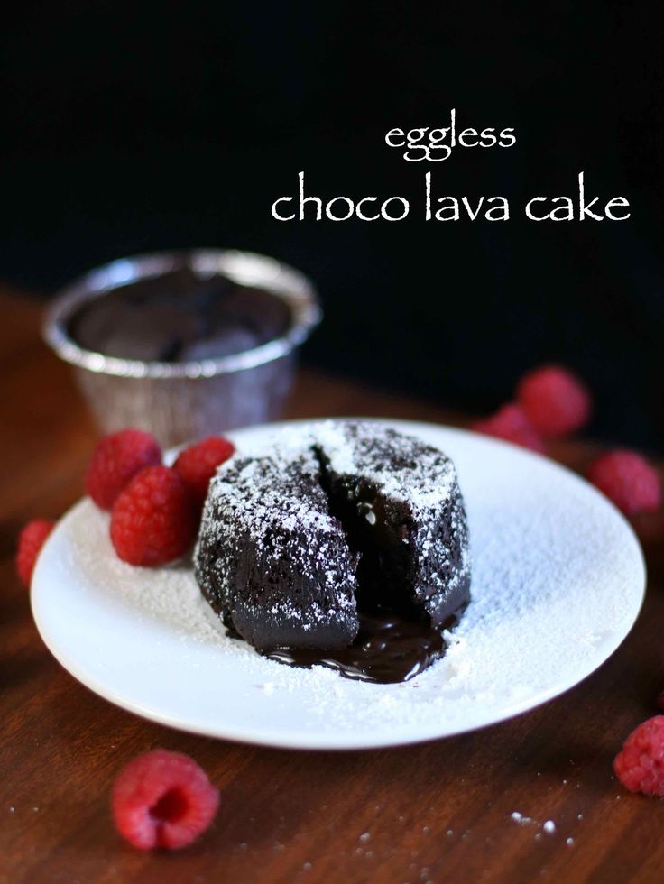 chocolate lava cake on a plate with raspberries