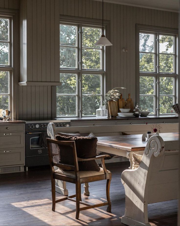 the kitchen is clean and ready to be used as a dining room or breakfast nook