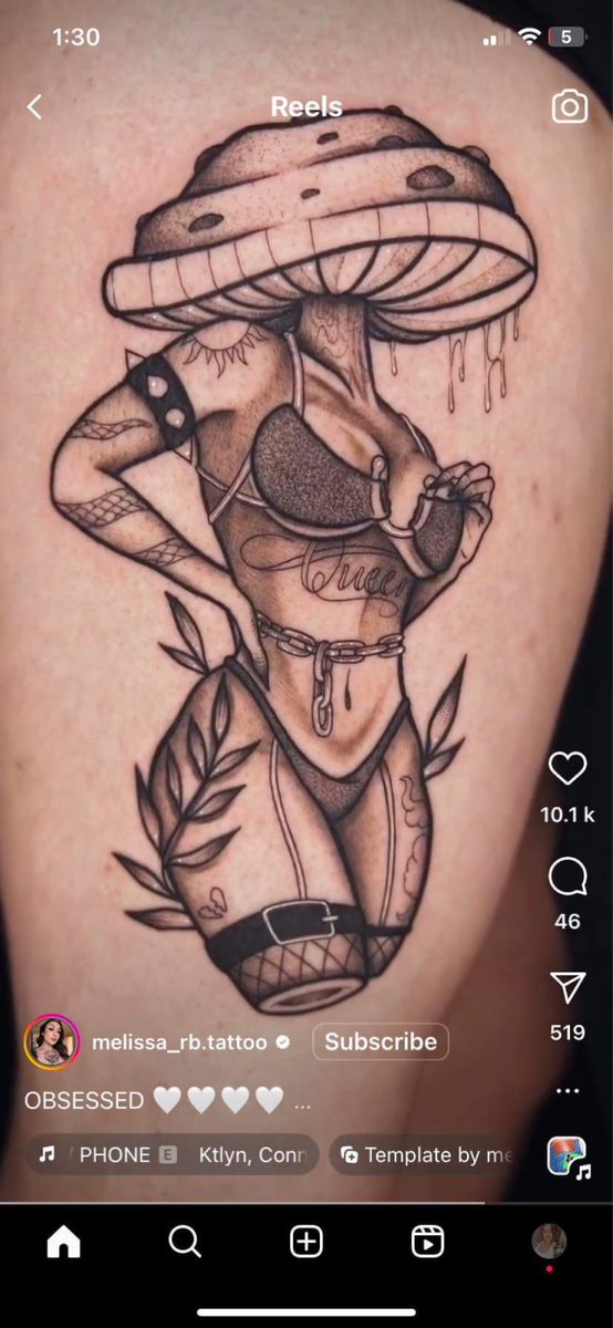 the back of a woman's thigh with an image of a mushroom on it