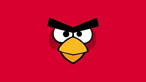 an angry bird face on a red background