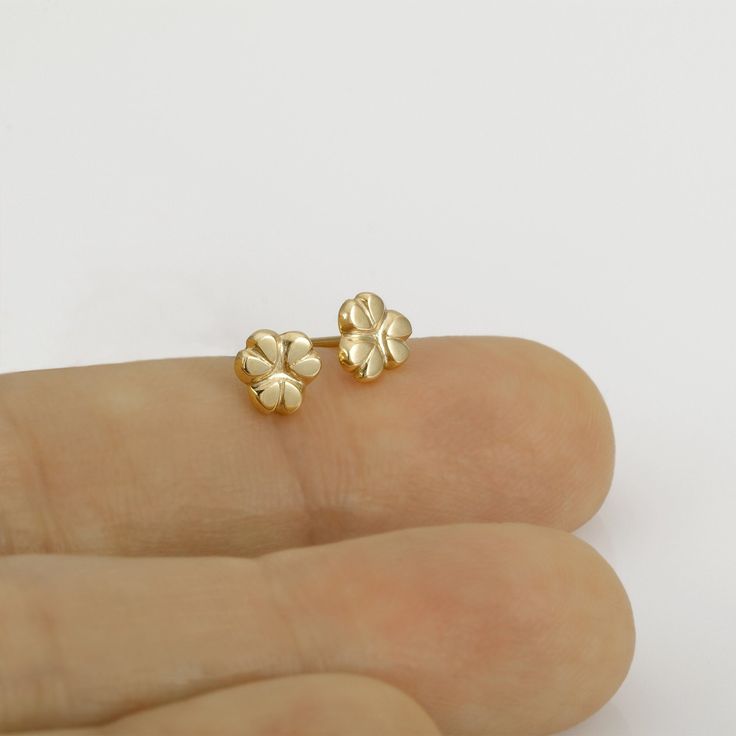 Shiny delicate flower 14k gold earrings studs, handmade of yellow 14k solid gold. These small dainty earrings are perfect for every day's wear. They are small but well noticeable. Smooth and shiny, and comfortable to wear. These beautiful classy earrings can be a great gift as they can be enjoyed at any age and outfit. 14k solid gold ear backs are included. Flower's diameter is approx 6 mm =  ~0.24 inch each * The earrings will be packed in a gift box ready to give as a gift, and shipped via Exp Earrings Studs Gold, Classy Earrings, Studs Gold, Dainty Studs, Flower Stud Earrings, Gold Stud Earrings, Flower Stud, Earrings Dainty, Earrings Studs