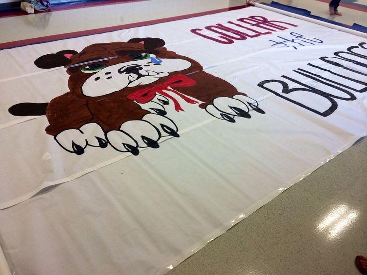 a banner with a teddy bear on it