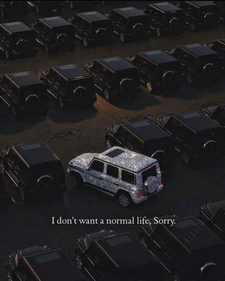 an aerial view of a parking lot full of cars with the words, i don't want a normal life sorry