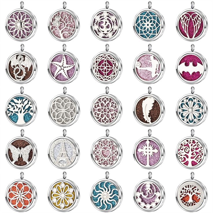 a collection of different colored pendants on a white background