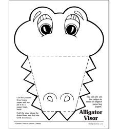 the alligator mask is cut out to make it look like an alligator