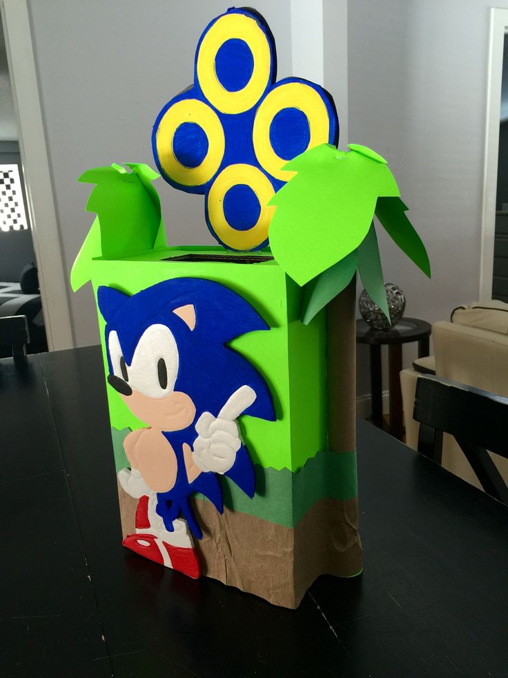 a cardboard box with an image of sonic the hedgehog in it on a table