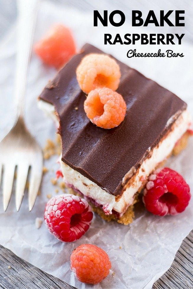 no bake raspberry cheesecake bars with chocolate frosting and fresh raspberries