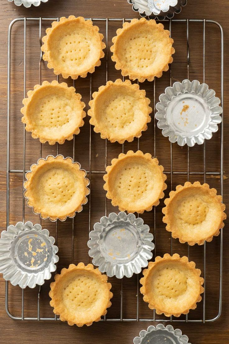 several small pies on a cooling rack